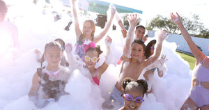 young kids at a foamdaddy foam party
